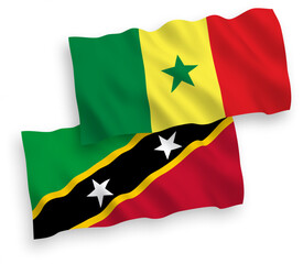 Flags of Federation of Saint Christopher and Nevis and Republic of Senegal on a white background