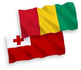 Flags of Kingdom of Tonga and Guinea on a white background