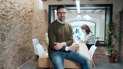 Video of successful architect team posing and looking at camera in a modern startup.