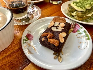 Fototapeta na wymiar pieces of chocolate steamed cake served on a coffee shop table