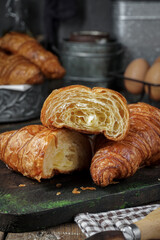 Close-up croissant on wooden table