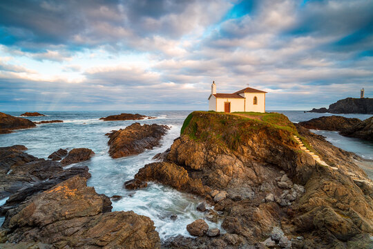 The Ermida da Virxe do Porto perched on a tiny rocky island