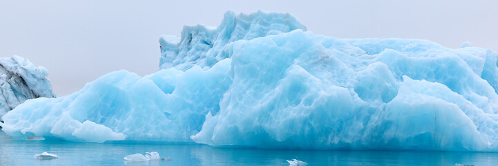 A blue iceberg in Iceland. A iceberg flowing into the Jokulsarlon lagoon, detached from the...