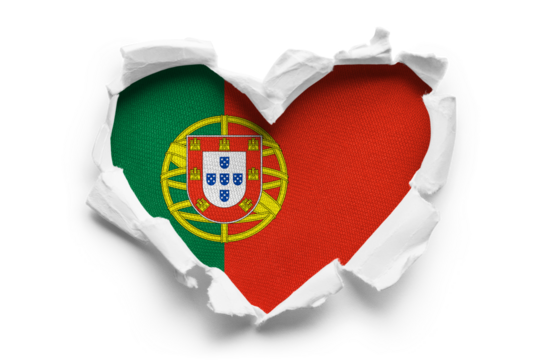 Heart shaped hole torn through paper, showing satin texture of flag of Portugal, cut out