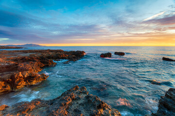 Beautiful sunrise over the mediterranean sea at Torres de la Sal