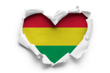Heart shaped hole torn through paper, showing satin texture of flag of Bolivia, cut out