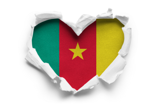 Heart shaped hole torn through paper, showing satin texture of flag of Cameroon, cut out
