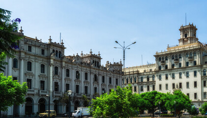 historical colonial style buildings surrounding the Plaza San Martin in Lima, Peru