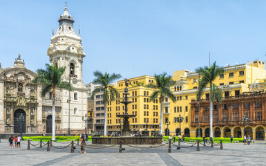 Fototapeta na wymiar Municipal Palace of Lima and fountain in Plaza de Armas, Lima, Peru, South America