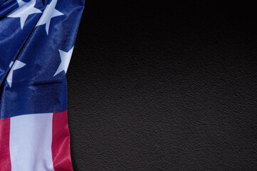 Flag United States of America for Memorial Day or 4th of July. US flag on dark background.
