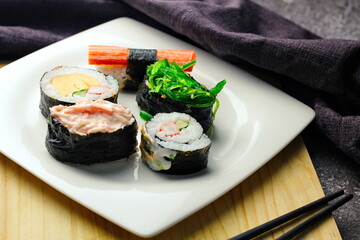 close up of sashimi sushi set with chopsticks and soy
