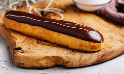Eclairs with chocolate close up or macro