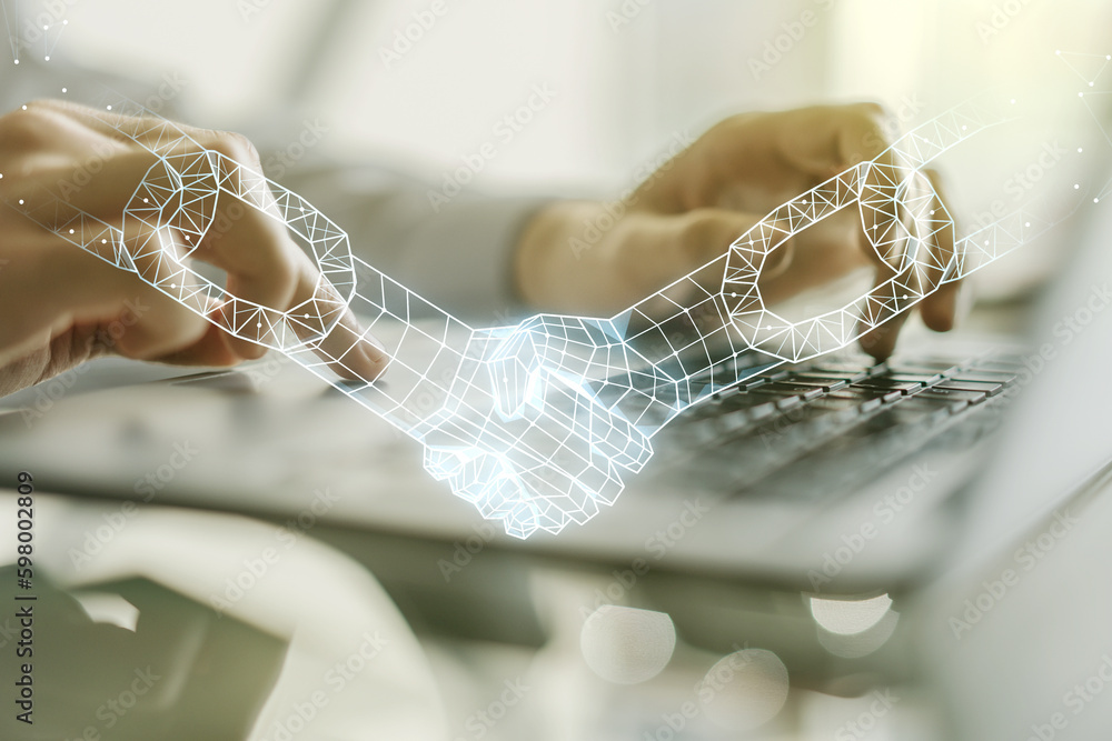 Poster double exposure of blockchain technology with handshake hologram and hands typing on laptop on backg