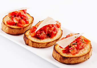 Traditional italian antipasto bruschetta appetizer with cherry tomatoes