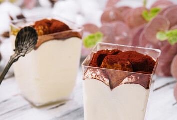 Traditional italian dessert tiramisu in a glass