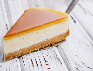 A piece of delicious caramel cheesecake