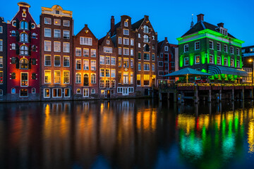 Typical Dutch houses in Amsterdam at dusk. Holland