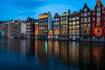 Typical Dutch houses in Amsterdam at dusk. Holland