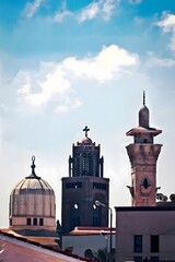 Fototapeta na wymiar Dome and Cross: A Mosque and Church in Harmony