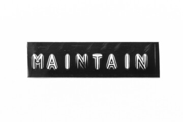 Black color banner that have embossed letter with word maintain on white paper background