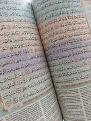 Jakarta, Indonesia - OCT 2022 : al-Quran is a holy book of Islamic guidance isolated. religion concept.