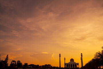 Fototapeta na wymiar The landscape of beautiful sunset sky at Central Mosque, Songkhla province, Thailand, letter translated The Central Mosque Songkhla.