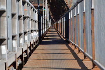 Long pedestrian catwalk on Quebec bridge
