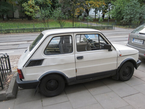 white Fiat 126 car parked