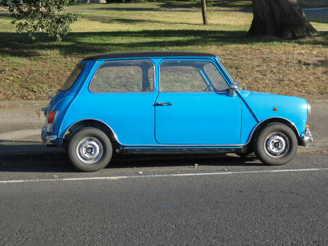 light blue Mini Cooper car