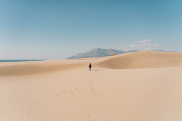 Woman in the desert in Patara Beach Turkey