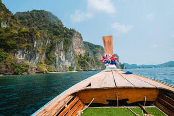 travel by longtail boat in Phi Phi islands