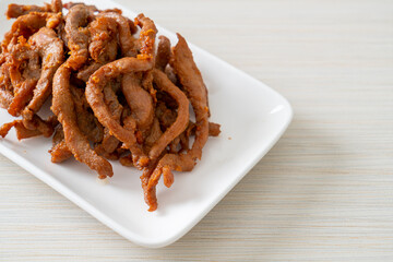 Sun-Dried Pork on white plate