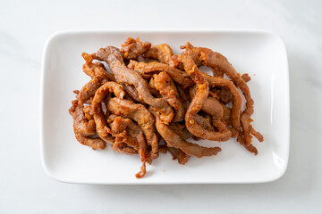 Sun-Dried Pork on white plate