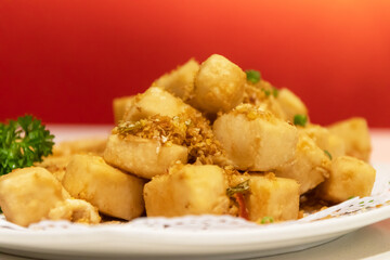 Spicy salt, garlic and pepper stir-fried tofu.