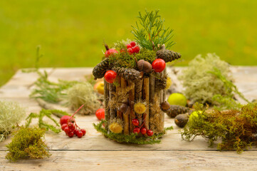 DIY autumn garden decoration for Thanksgiving day. made of natural materials and old tin can, zero...