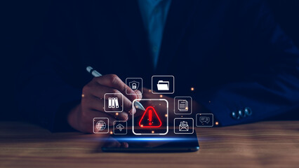 Businessman staff, programmer, developer using technology with triangle caution warning sign...