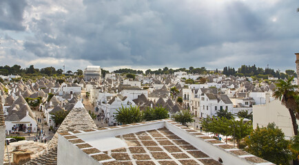 Alberobello, Puglia, Italy: Typical houses built with dry stone walls and conical roofs of the...