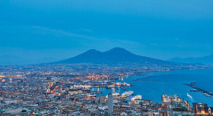 Fototapeta na wymiar Naples, Italy. Beautiful sunset lights over the Naples' Bay with the marina