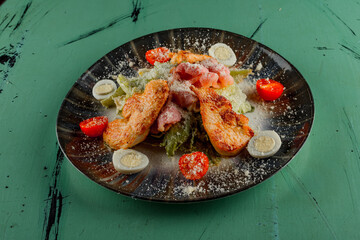 caesar salad on green table