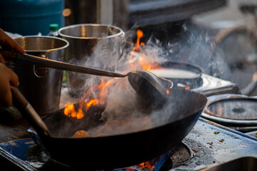 Pad Thai favorite and famous Asian Thai street fast food in hot pan, Pad Thai is stir fried rice...