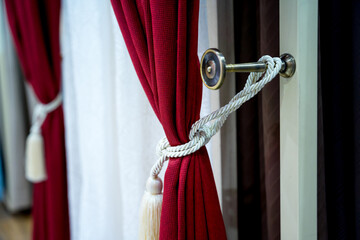Displayed colorful curtain samples at the showroom of a large store 