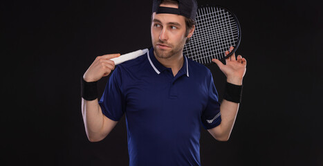 Tennis player with racket. Download a high-resolution photo of a tennis player to advertise...