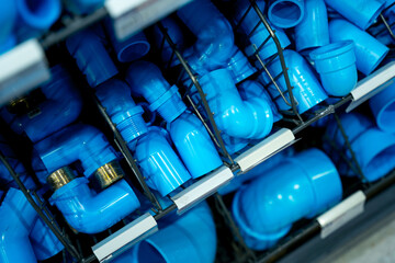 Water PVC pipes placed on the shelf in the building materials store. 