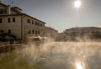 Old thermal baths in the medieval village of Bagno Vignoni, Siena province, Tuscany, Italy