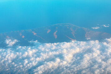 Naklejka na ściany i meble Aerial view of sea coast and clouds