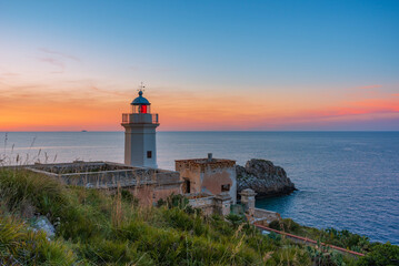 Fototapeta na wymiar The Capo Zafferano lighthouse at dusk, province of Palermo IT