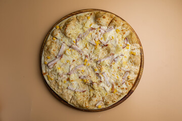 delicious pizza on a white wooden table. close-up
