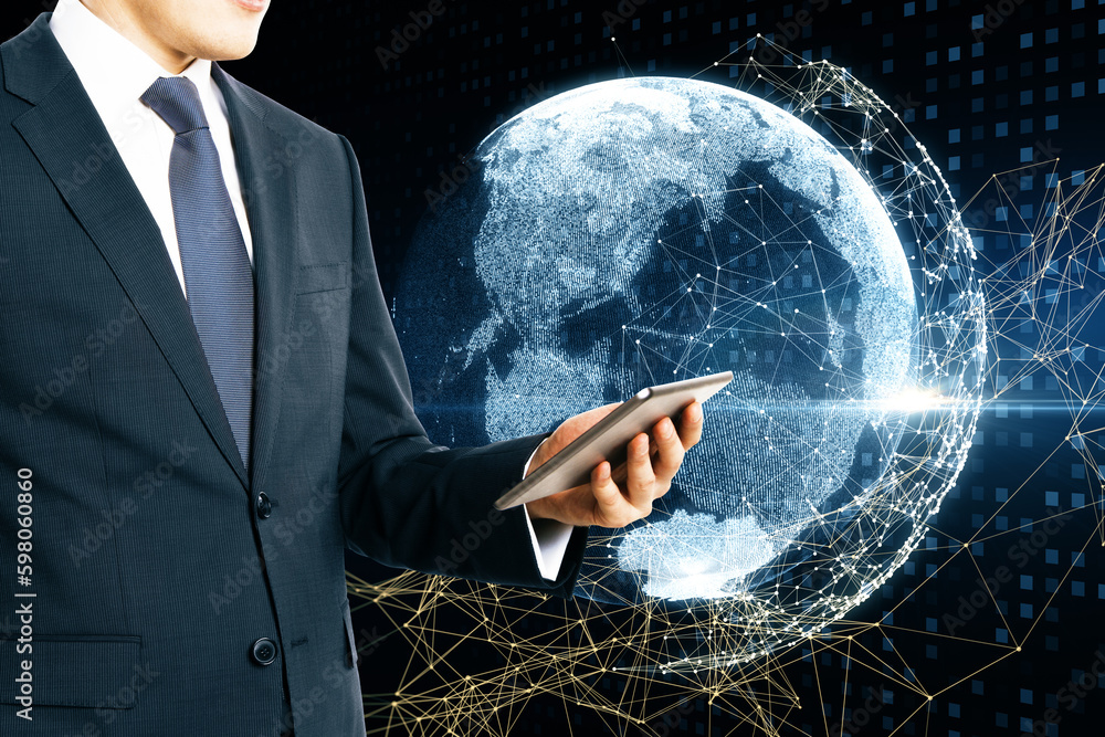 Poster close up of businessman hand using cellphone with glowing blue polygonal globe on blurry background.