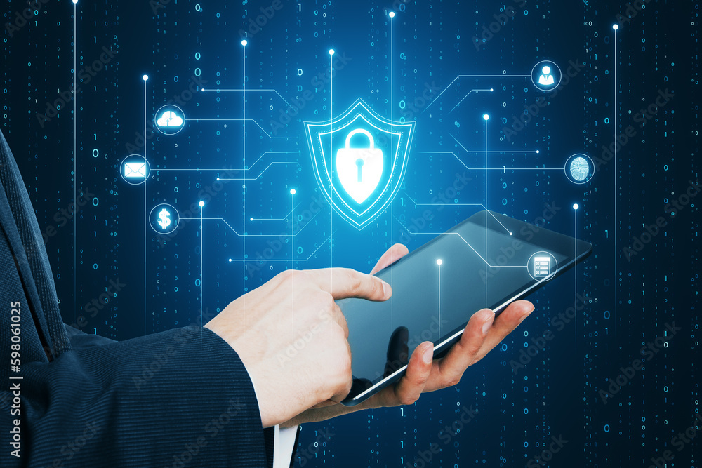 Poster Close up of male hands pointing at tablet with glowing blue padlock shield with digital coding on dark background. Safety, programming and access concept.