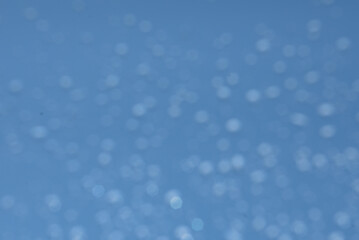 abstract blue background with hard bokeh